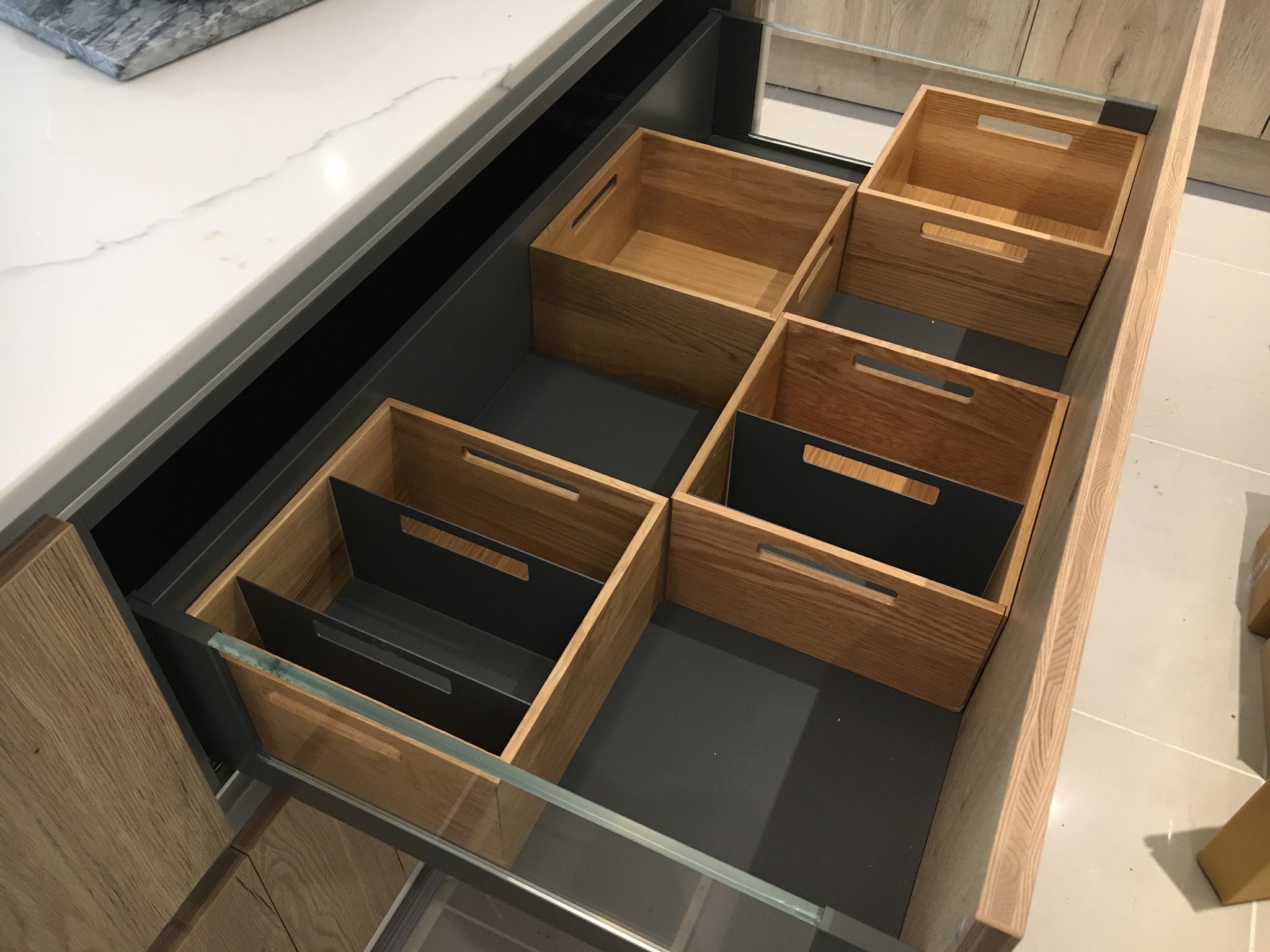 Drawer with oak dividers and glass sides